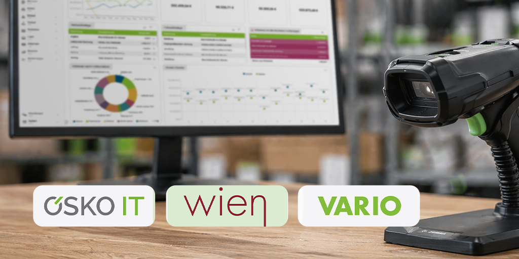 VARIO Cloud Event OSKO IT Handscanner auf einem Schreibtisch im Lager mit Monitor im Hintergrund